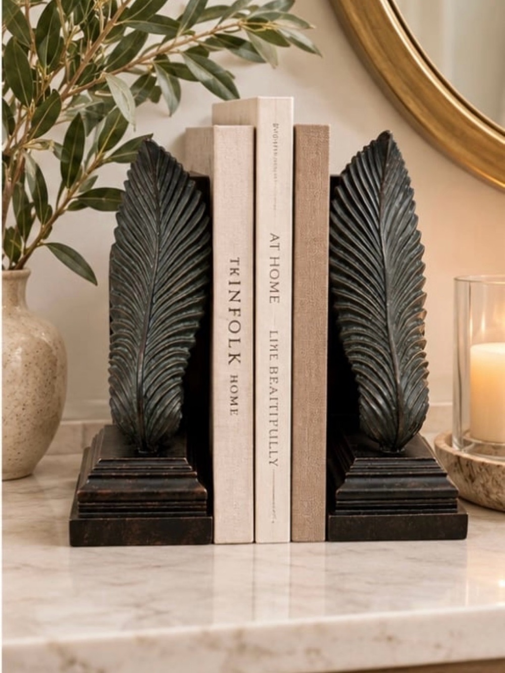 Pair Decorative Black Winged & Scroll Motif Shell Bookends Stepped Wooden Base